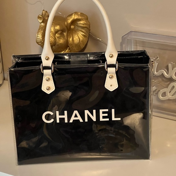 CHANEL Handbags - EUC Repurposed Chanel shopping bag turned purse - UNIQUE SUPER CUTE